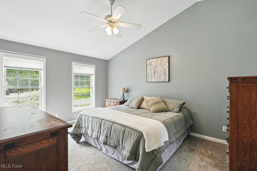 3385 Marsh Road Stow, OH 44224 - Photo 18 of 30 Bedroom featuring carpet, vaulted ceiling, baseboards, and ceiling fan
