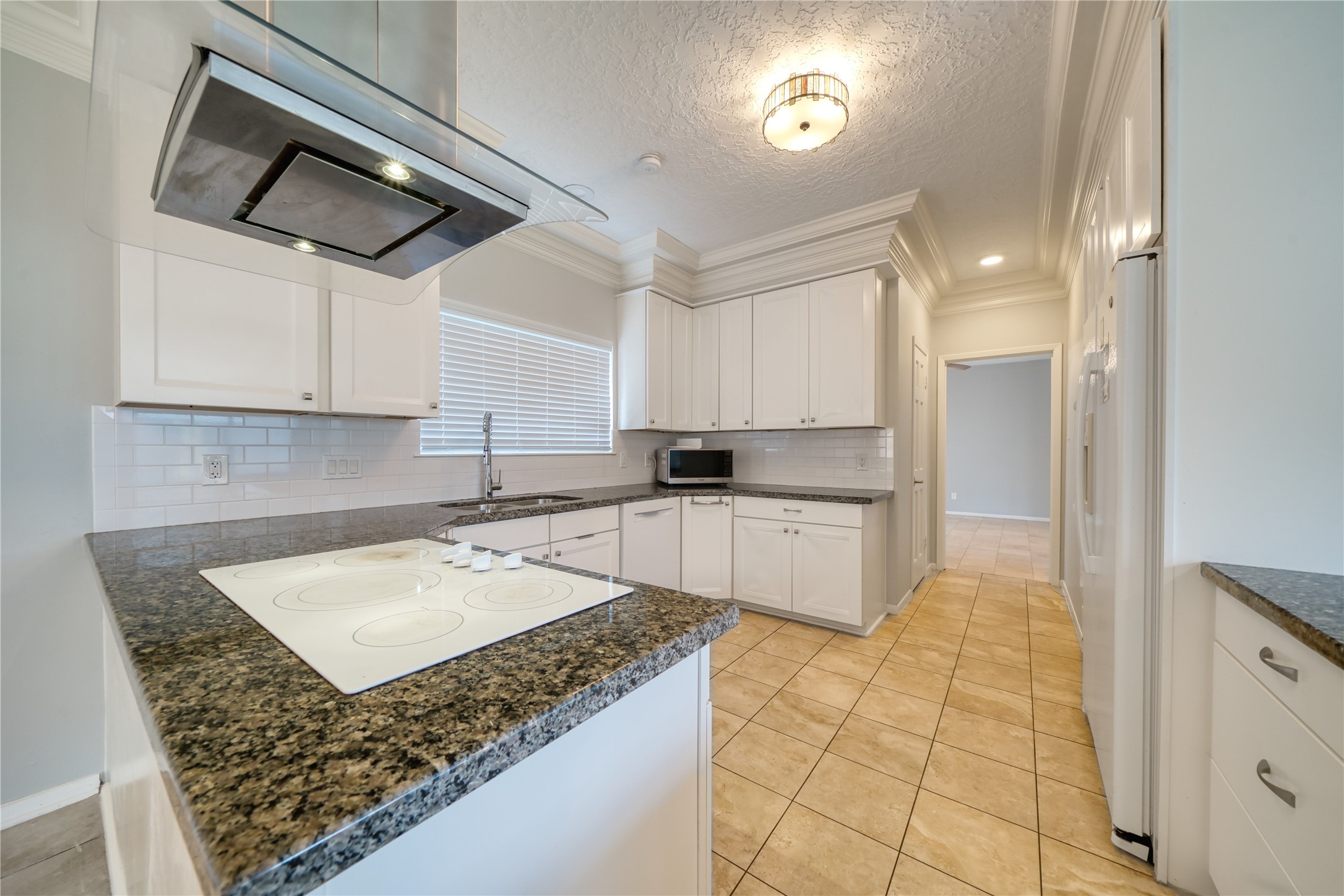 10919 Villa Lea Lane Houston, TX 77071 - Photo 20 of 45 a kitchen with stainless steel appliances granite countertop a sink stove and refrigerator
