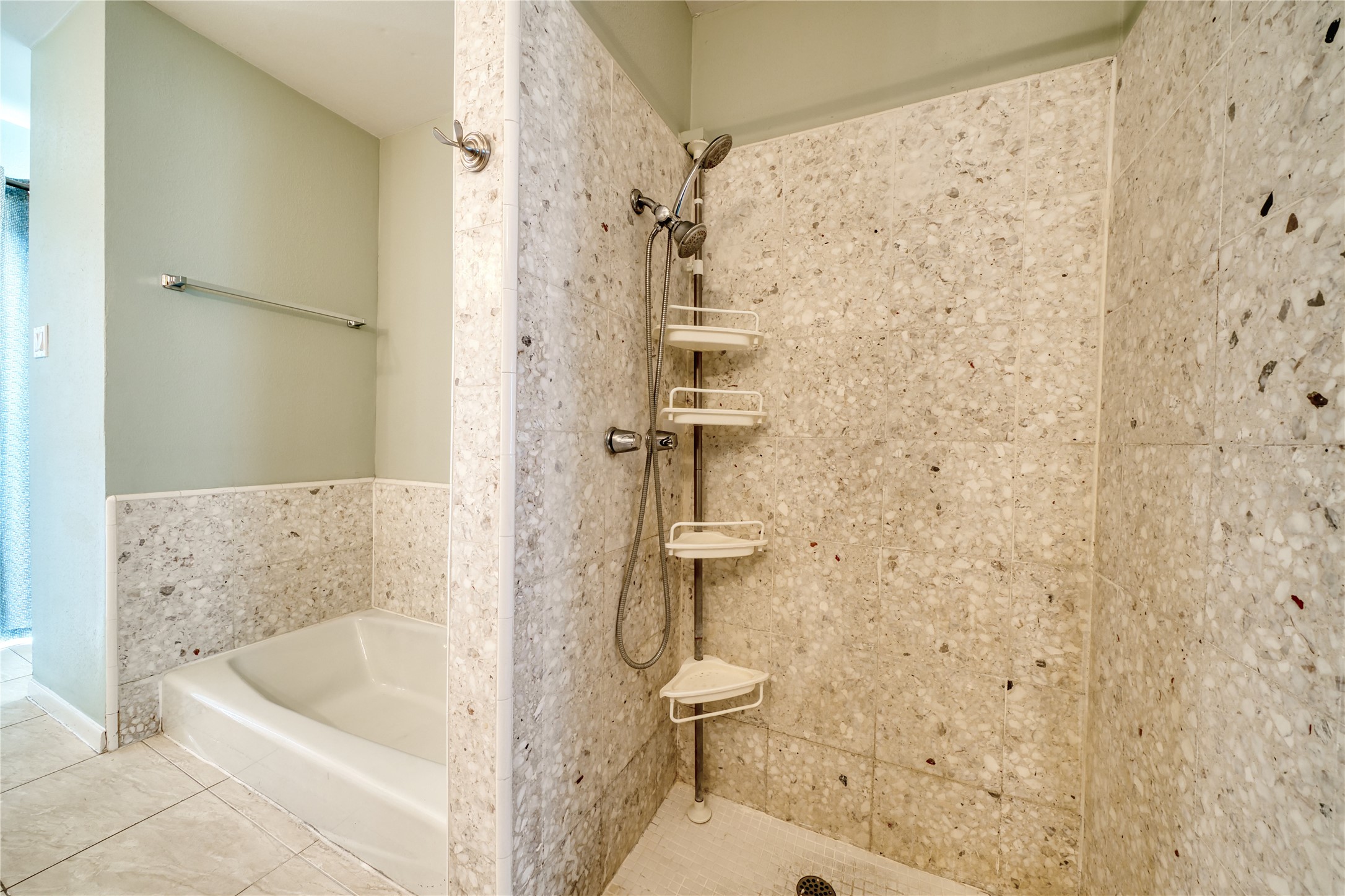 10919 Villa Lea Lane Houston, TX 77071 - Photo 37 of 45 a bathroom with a tub a toilet and a shower