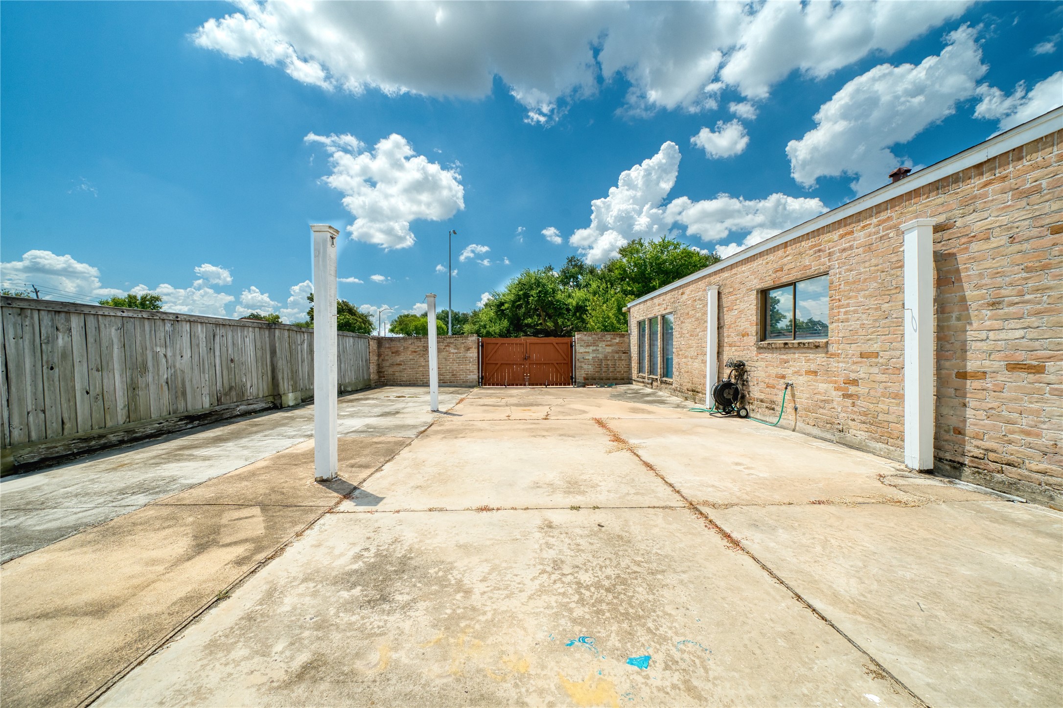 10919 Villa Lea Lane Houston, TX 77071 - Photo 43 of 45 a view of a house with a patio