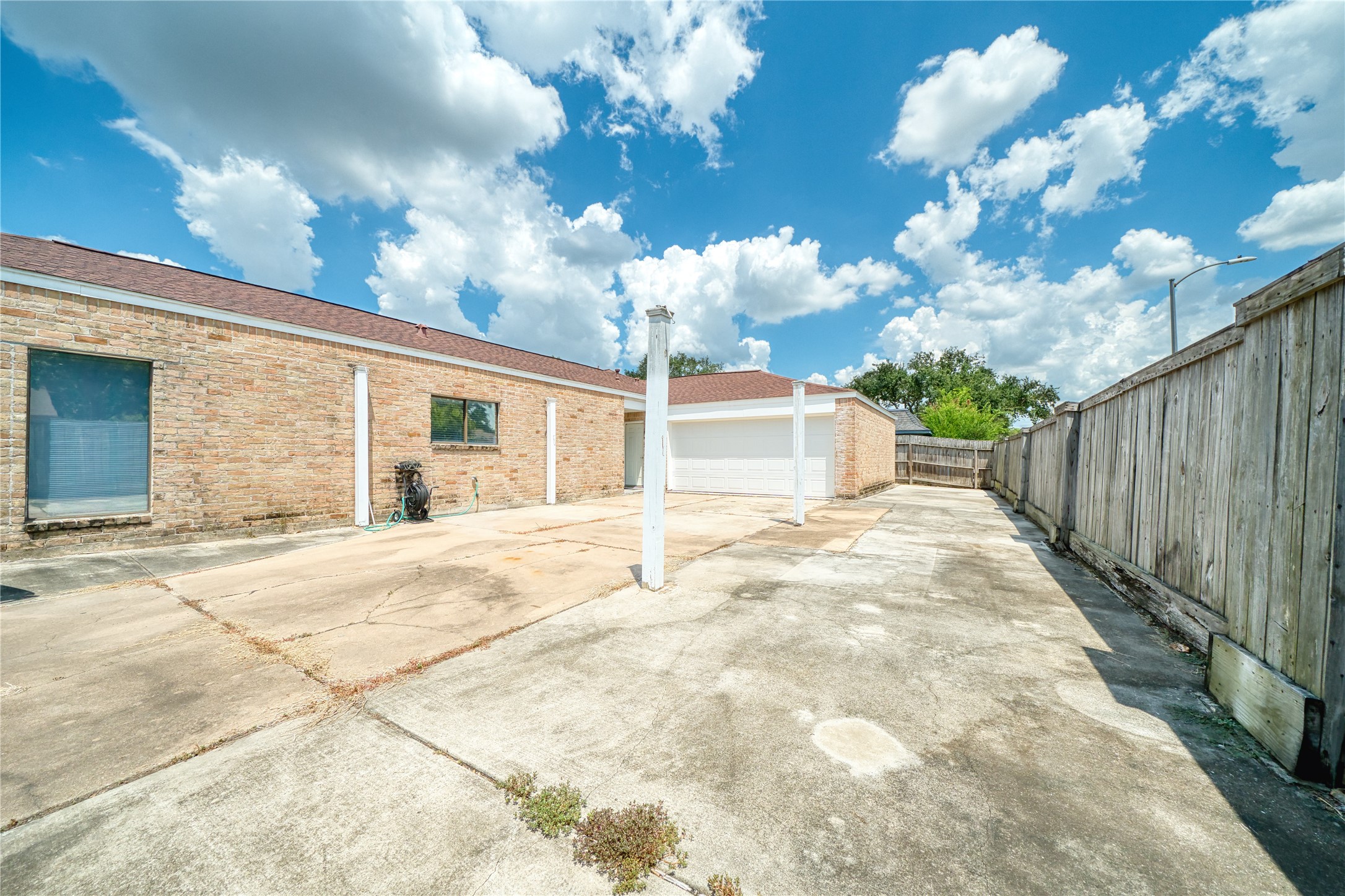 10919 Villa Lea Lane Houston, TX 77071 - Photo 44 of 45 a view of a house with a patio