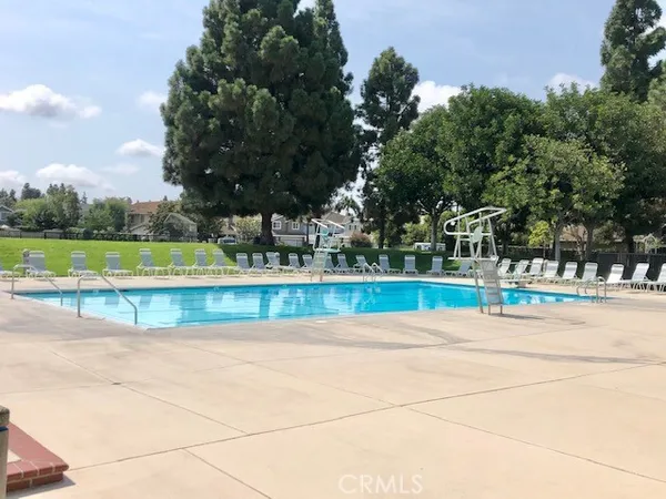 a view of a ocean with a floor to ceiling windows