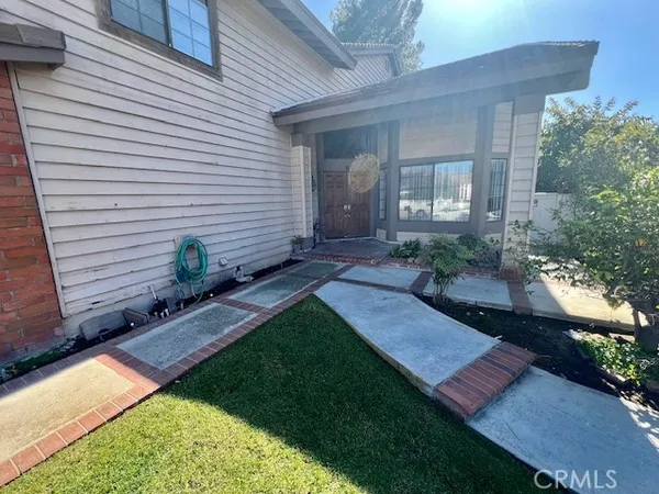 a view of a garden with pathway