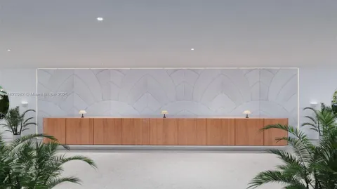 a living room with furniture potted plant and windows