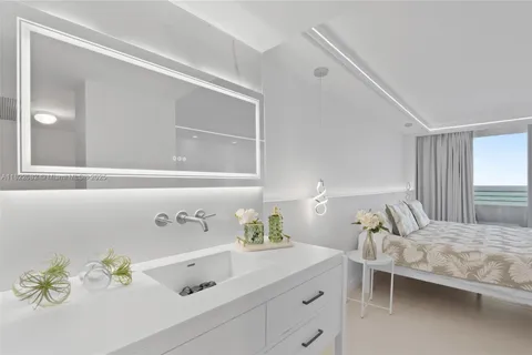 a white bath tub sitting in a bathroom