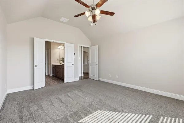 an aerial view of residential houses with outdoor space and street view