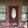 a close view of a wooden door of a house