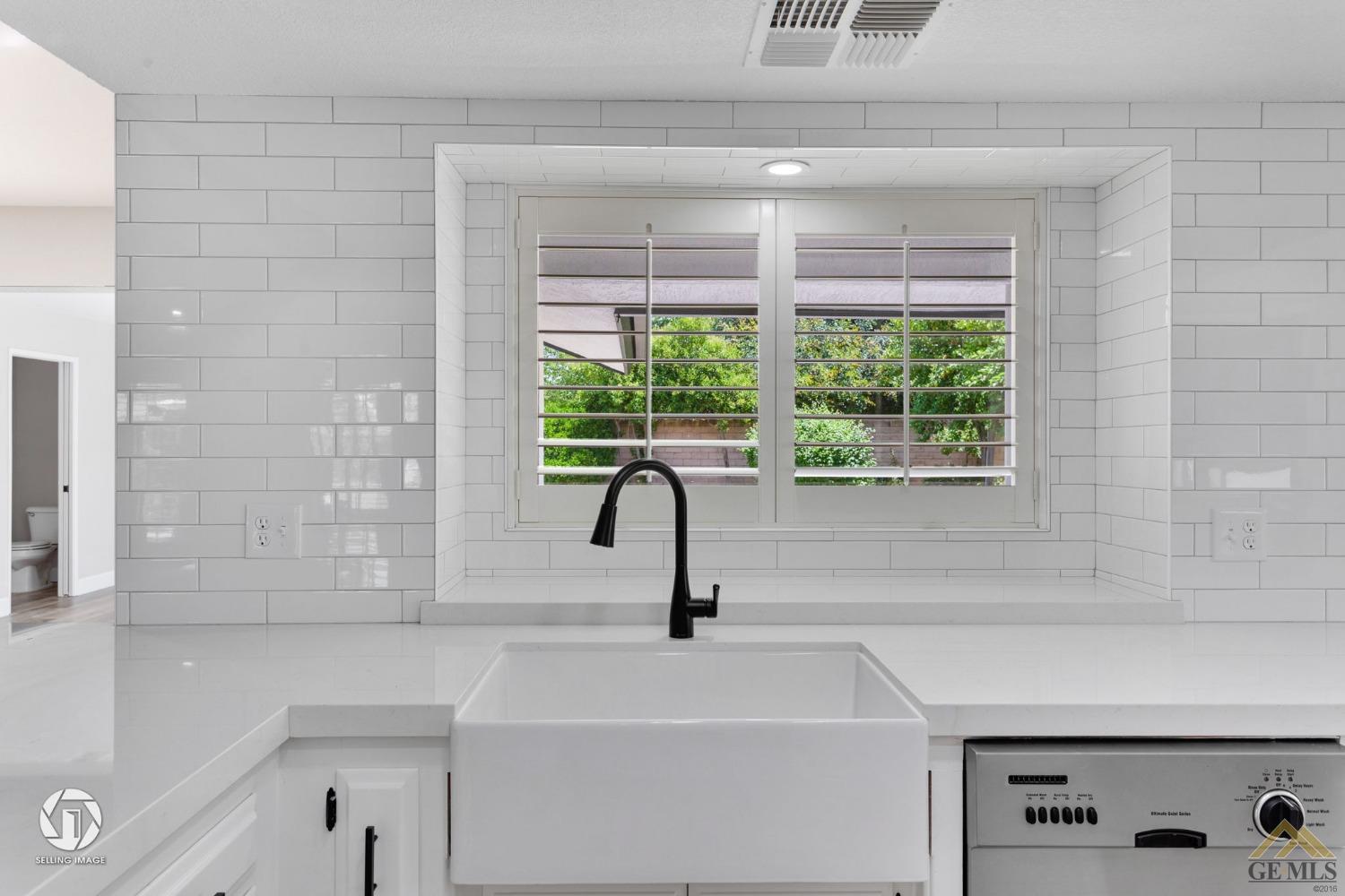 Undisclosed Address Bakersfield, CA 93308 - Photo 26 of 48 a bathroom with a sink and a window