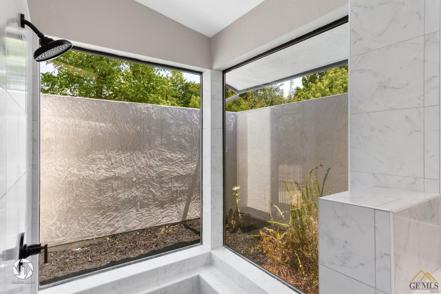 Undisclosed Address Bakersfield, CA 93308 - Photo 34 of 48 a view of a glass door with a outdoor space