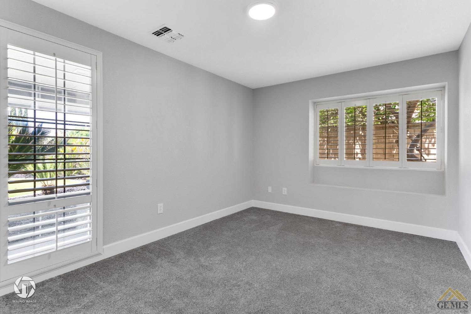 Undisclosed Address Bakersfield, CA 93308 - Photo 35 of 48 an empty room with a window