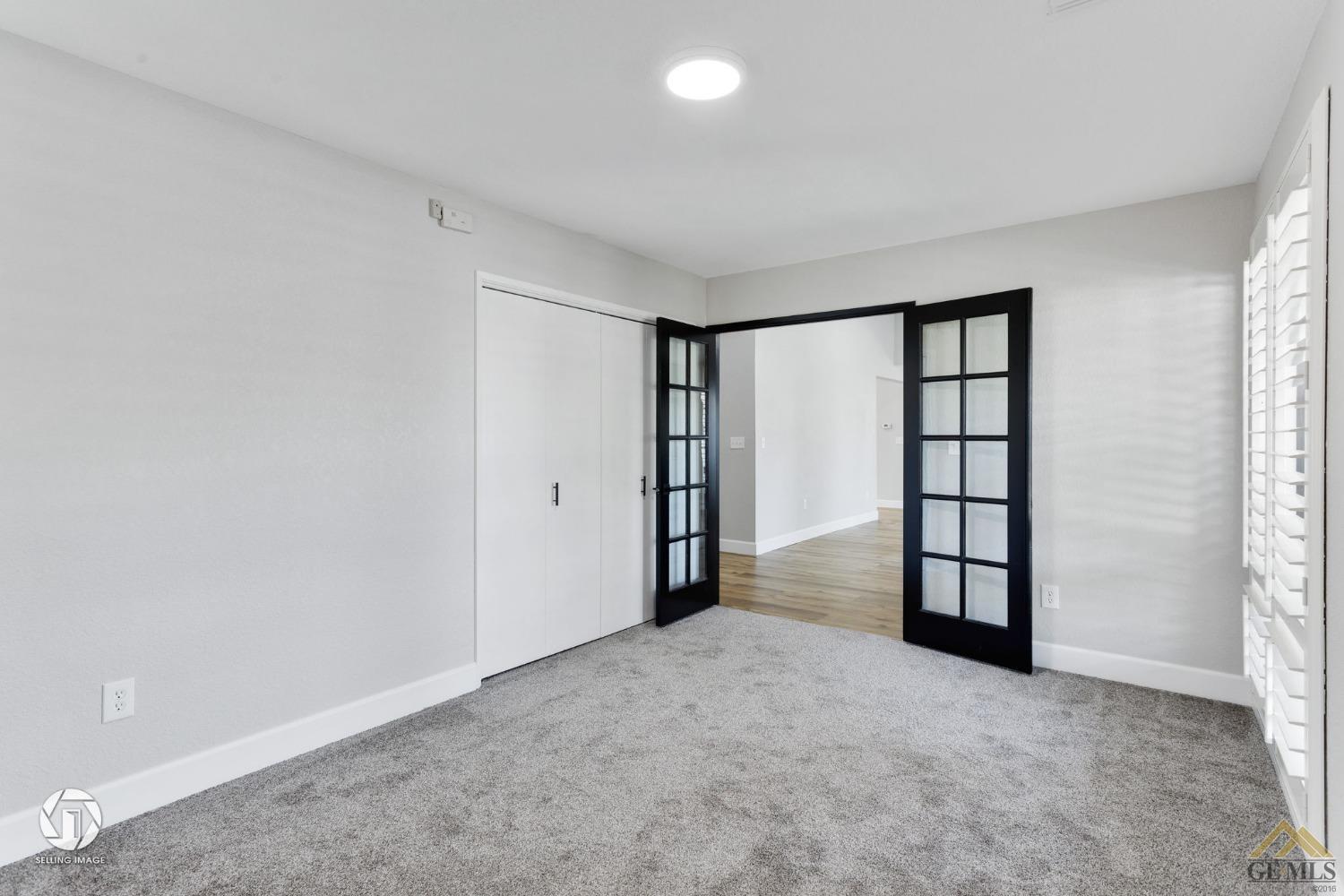 Undisclosed Address Bakersfield, CA 93308 - Photo 36 of 48 a view of an empty room with a window