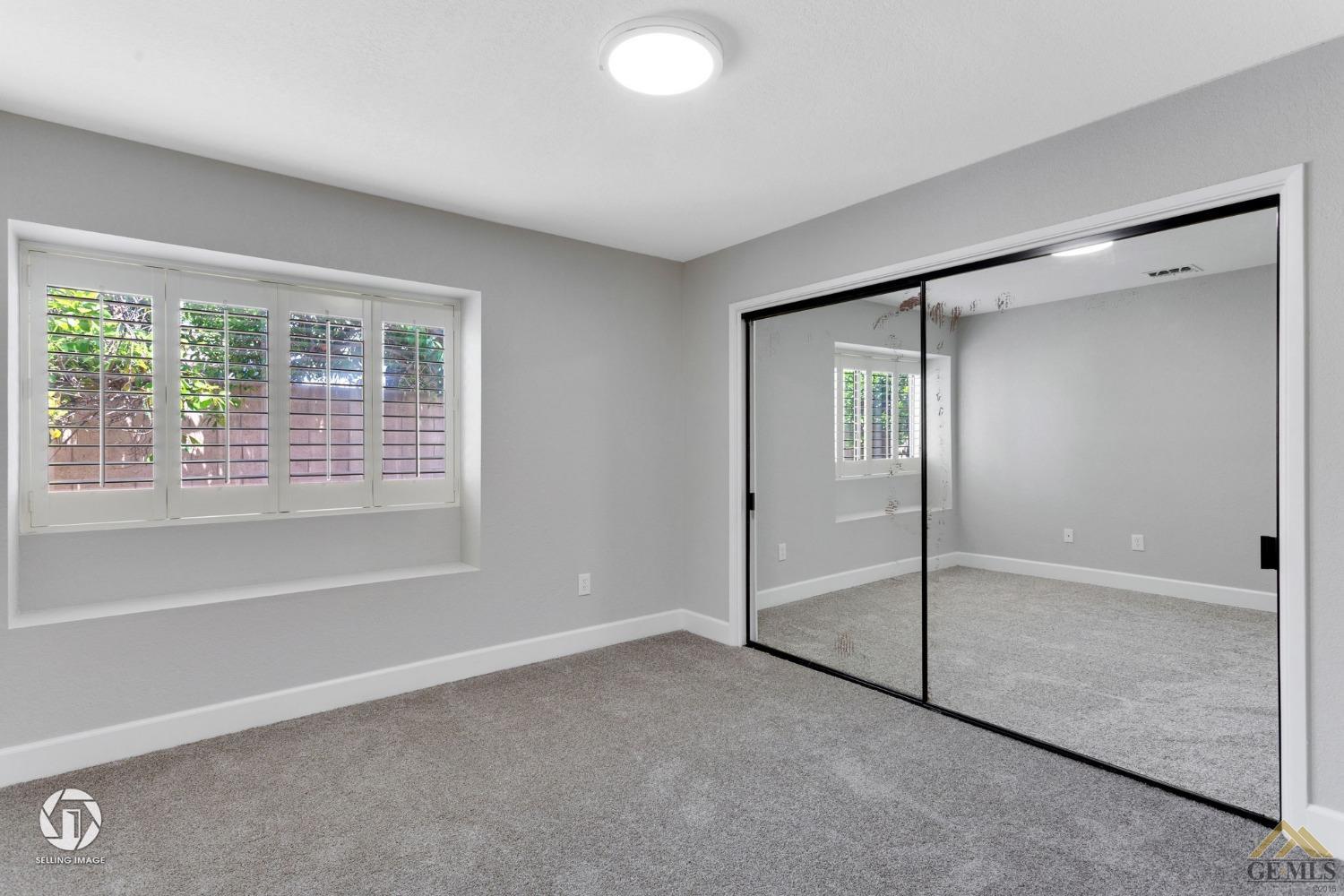 Undisclosed Address Bakersfield, CA 93308 - Photo 37 of 48 a view of an empty room with a window