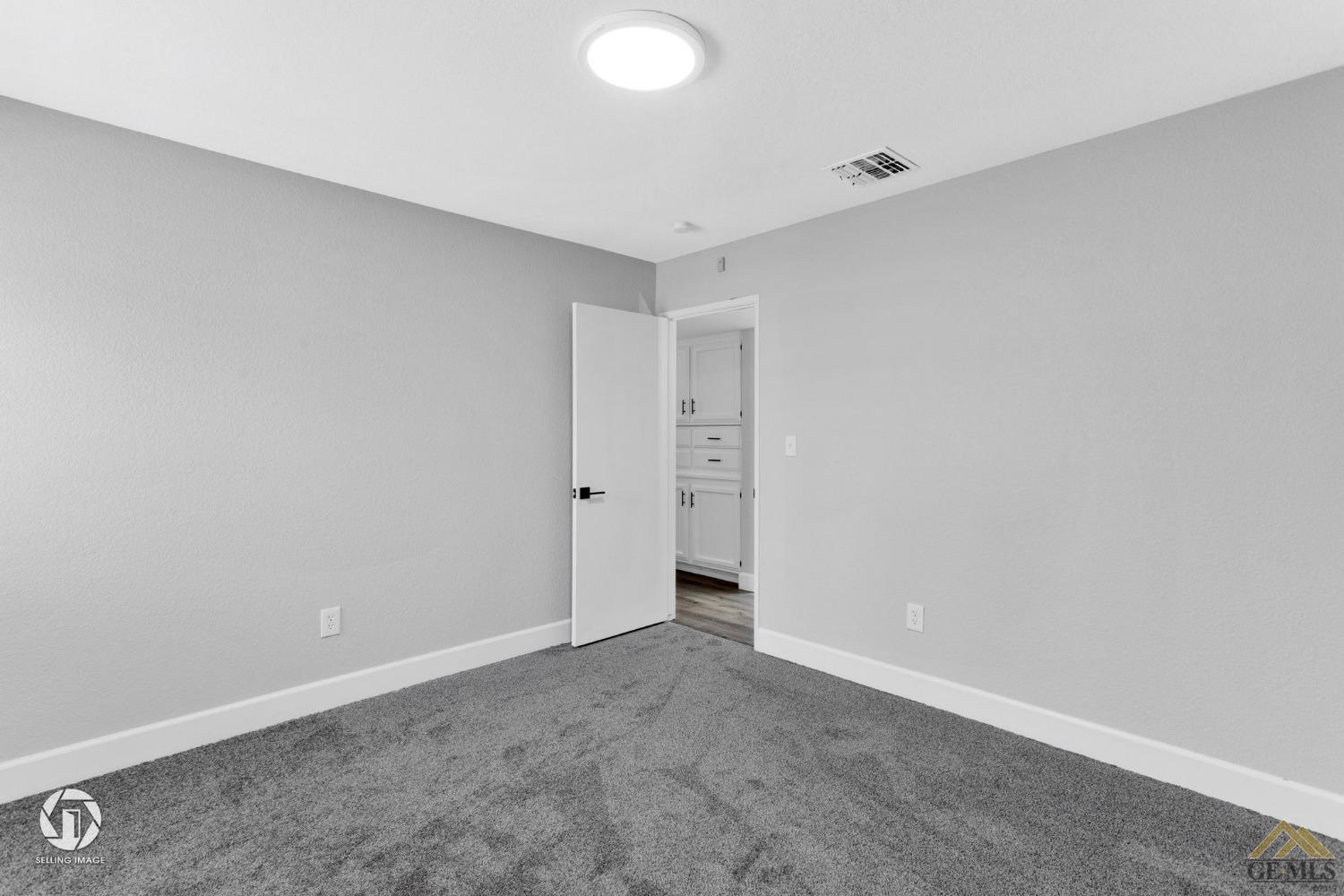 Undisclosed Address Bakersfield, CA 93308 - Photo 42 of 48 a view of an empty room