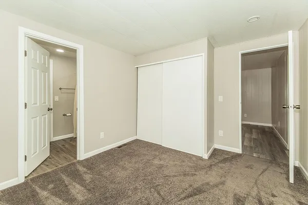 a view of a sink and a mirror in a room