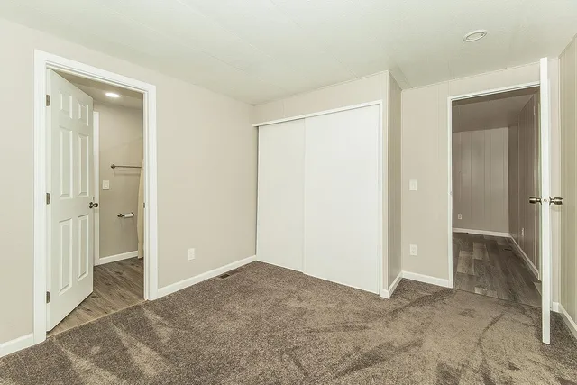 a view of a sink and a mirror in a room