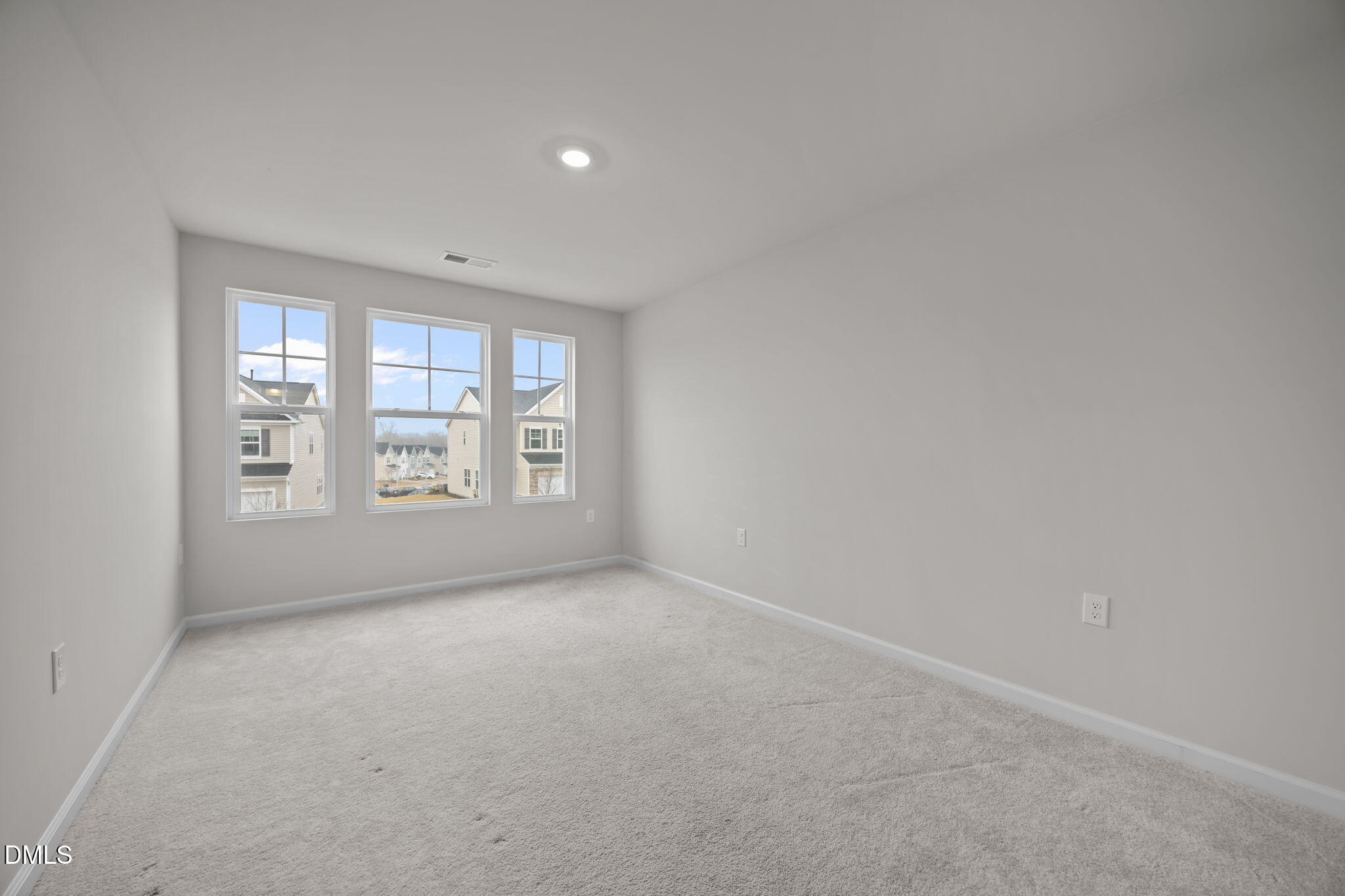 5016 Kota Street Raleigh, NC 27610 - Photo 14 of 37 an empty room with windows