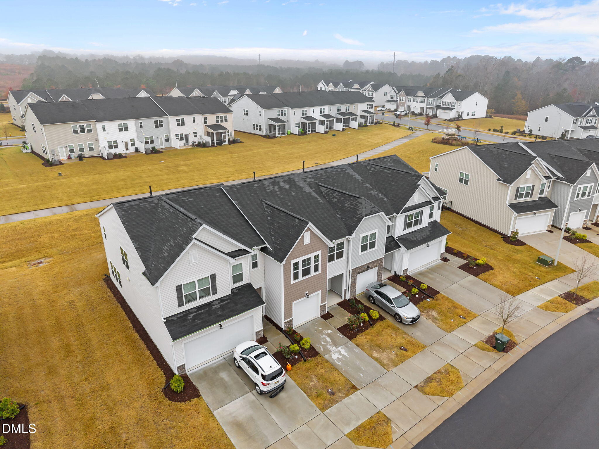 5016 Kota Street Raleigh, NC 27610 - Photo 34 of 37 an aerial view of residential house with swimming pool and ocean view