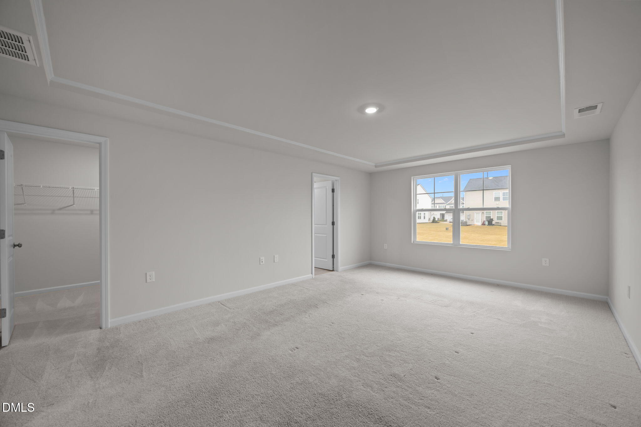 5016 Kota Street Raleigh, NC 27610 - Photo 8 of 37 a view of an empty room with a window