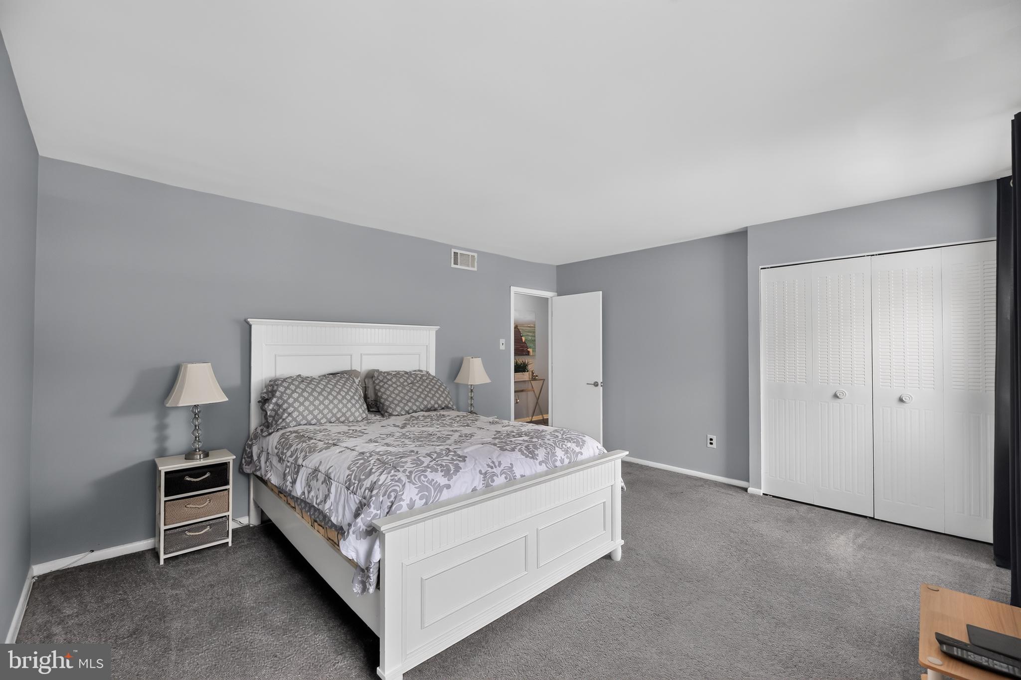 1802 Winding Way Clementon, NJ 08021 - Photo 23 of 30 a bedroom with a bed and a cabinets