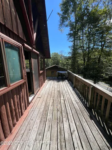 a view of a livingroom with furniture and a fireplace