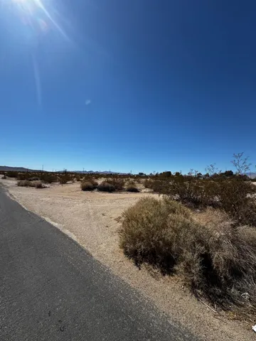 a view of an ocean and mountain