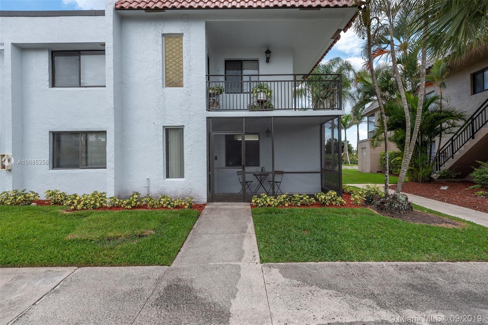 310 Racquet Club Road, Unit 106 Weston, FL 33326 - Photo 1 of 20