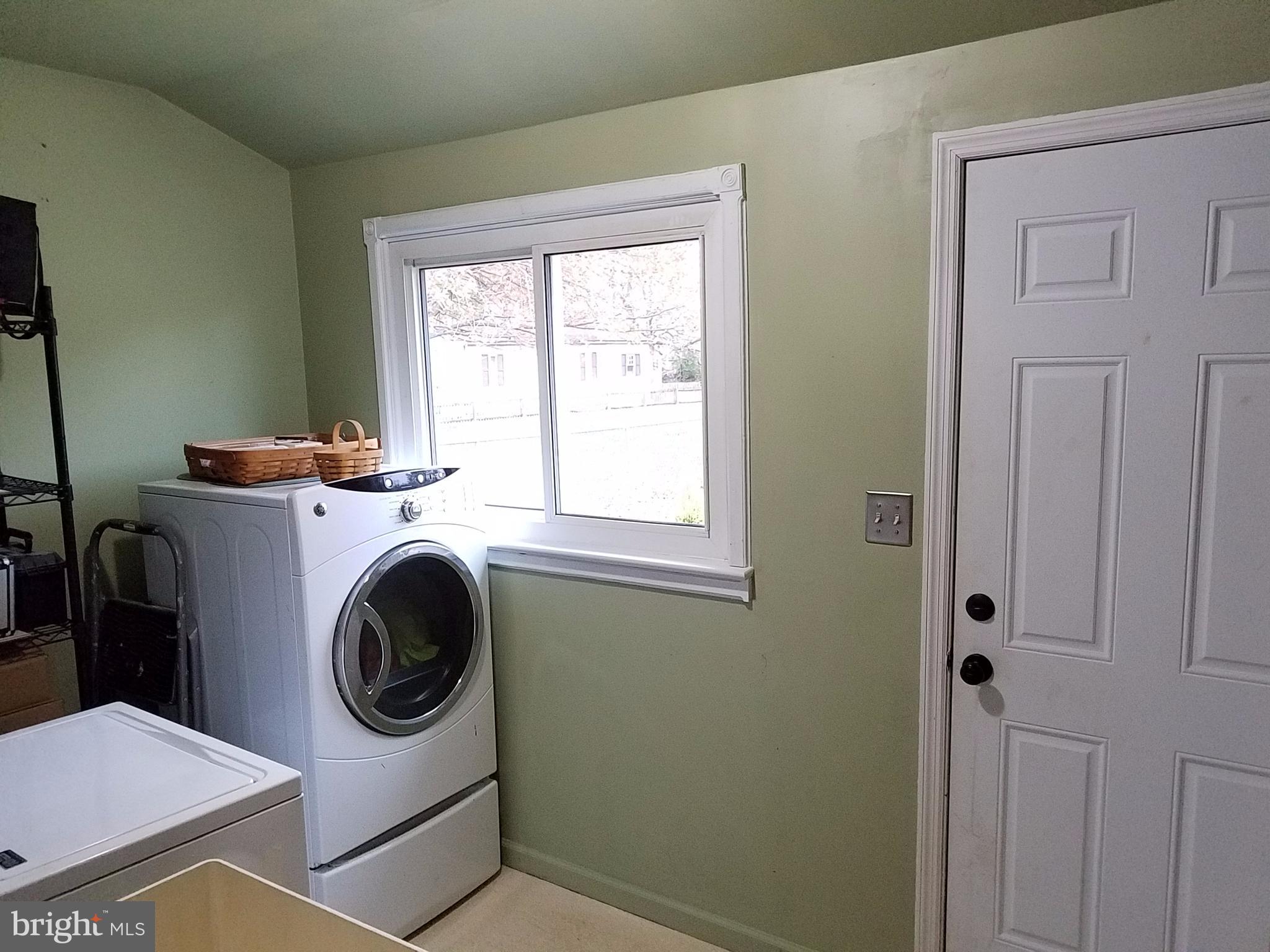 91 North Line Road Stevens, PA 17578 - Photo 7 of 18 1st floor laundry with access to back patio
