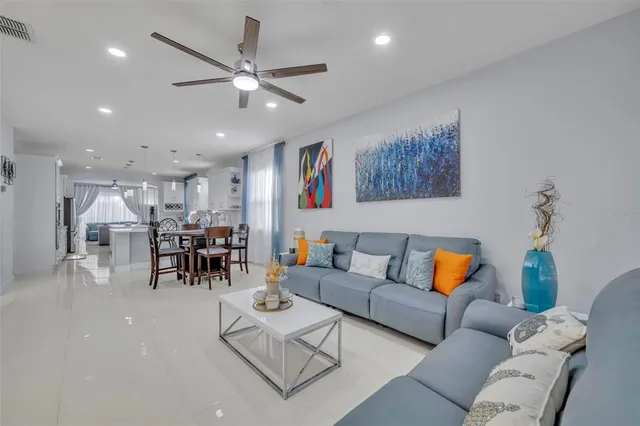 a living room with furniture and furniture