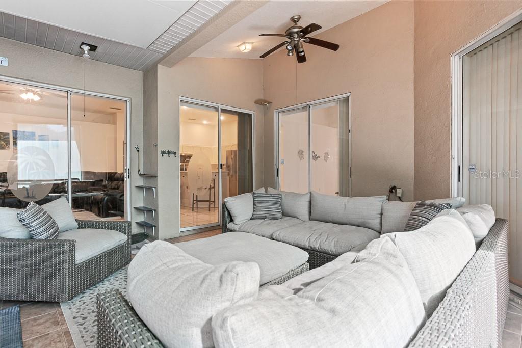 828 Innergary Place Valrico, FL 33594 - Photo 18 of 20 a living room with furniture and a large window