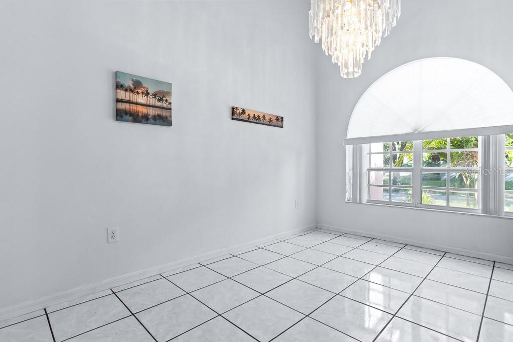 828 Innergary Place Valrico, FL 33594 - Photo 7 of 20 a view of an empty room with a window