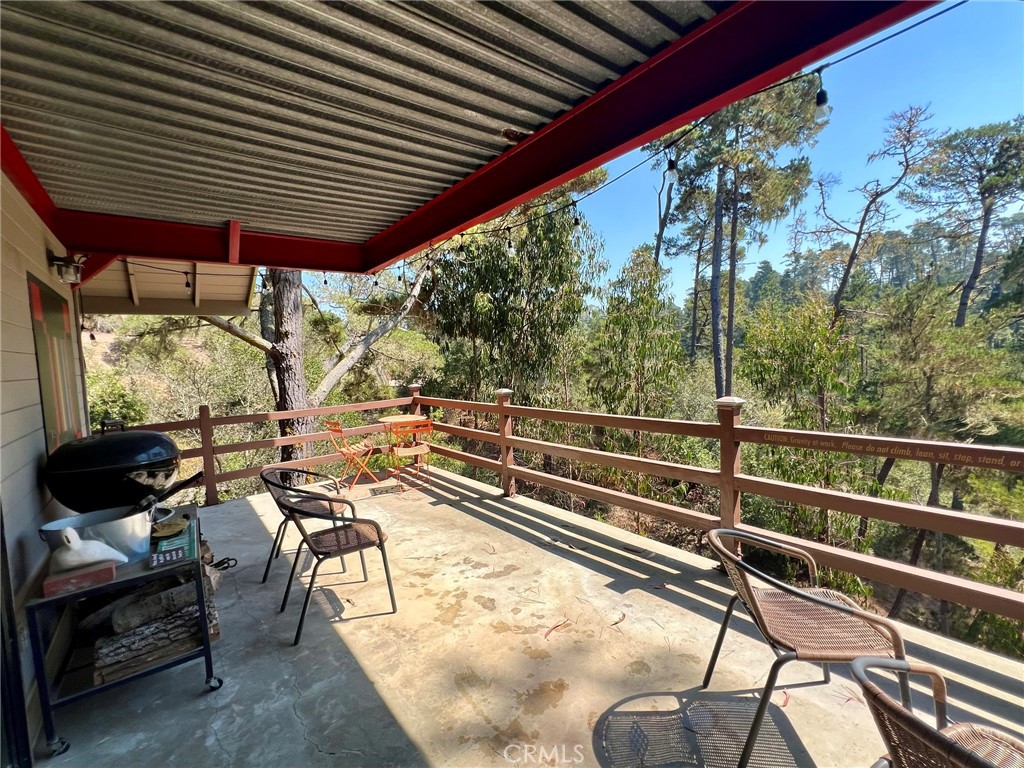 3151 Ramsey Road Cambria, CA 93428 - Photo 25 of 46 Living room deck, BBQ and deck chairs to use.