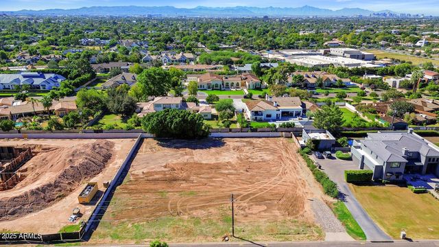 a view of a swimming pool and an outdoor space