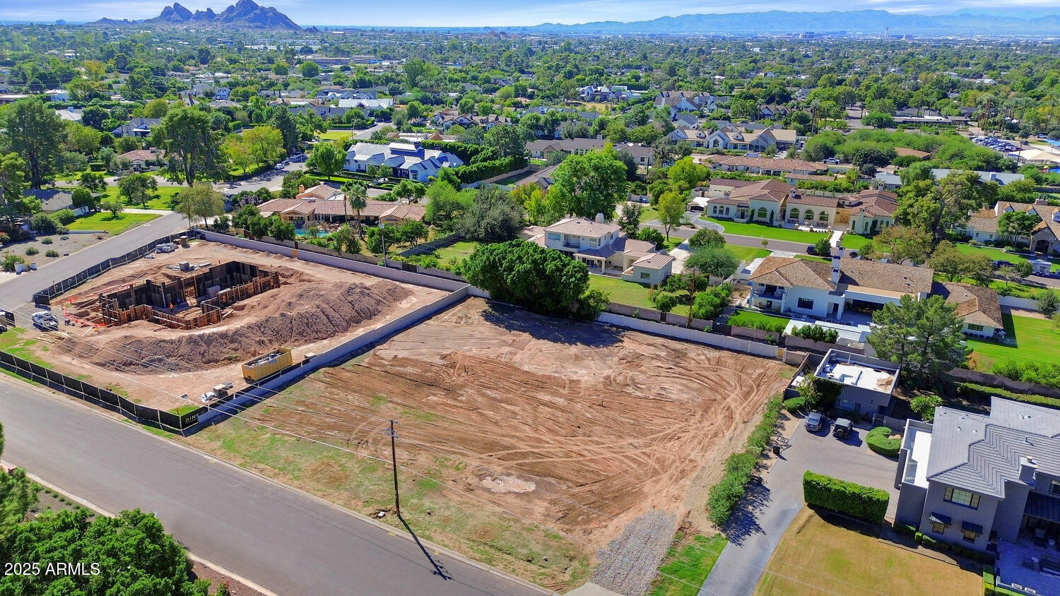5335 East Exeter Boulevard, Unit 45 Phoenix, AZ 85018 - Photo 6 of 7 an aerial view of a house