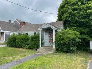 104 High School Road Hyannis, MA 02601 - Photo 11 of 14 a front view of a house with garden
