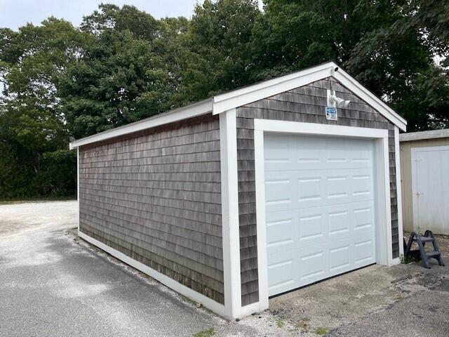 104 High School Road Hyannis, MA 02601 - Photo 3 of 14 a view of a house with a garage
