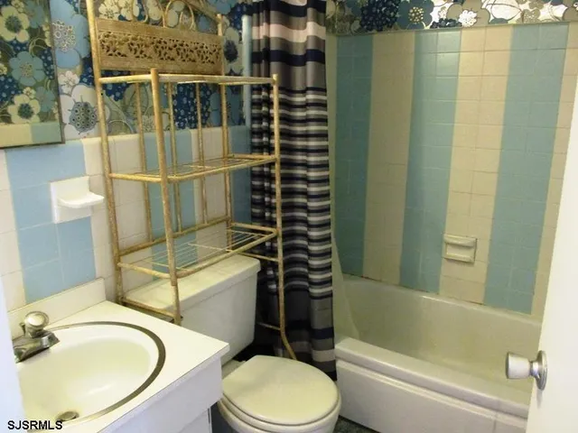 a view of swimming pool with outdoor seating