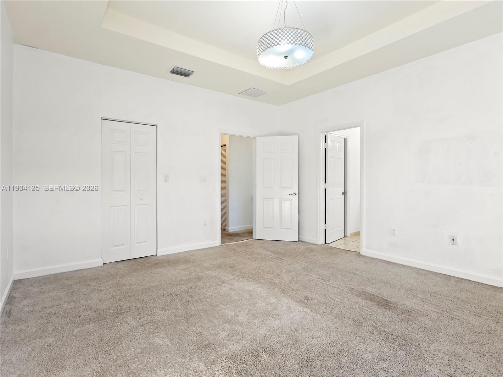 11410 Southwest 252nd Terrace Homestead, FL 33032 - Photo 21 of 38 an empty room with a empty space and a ceiling fan
