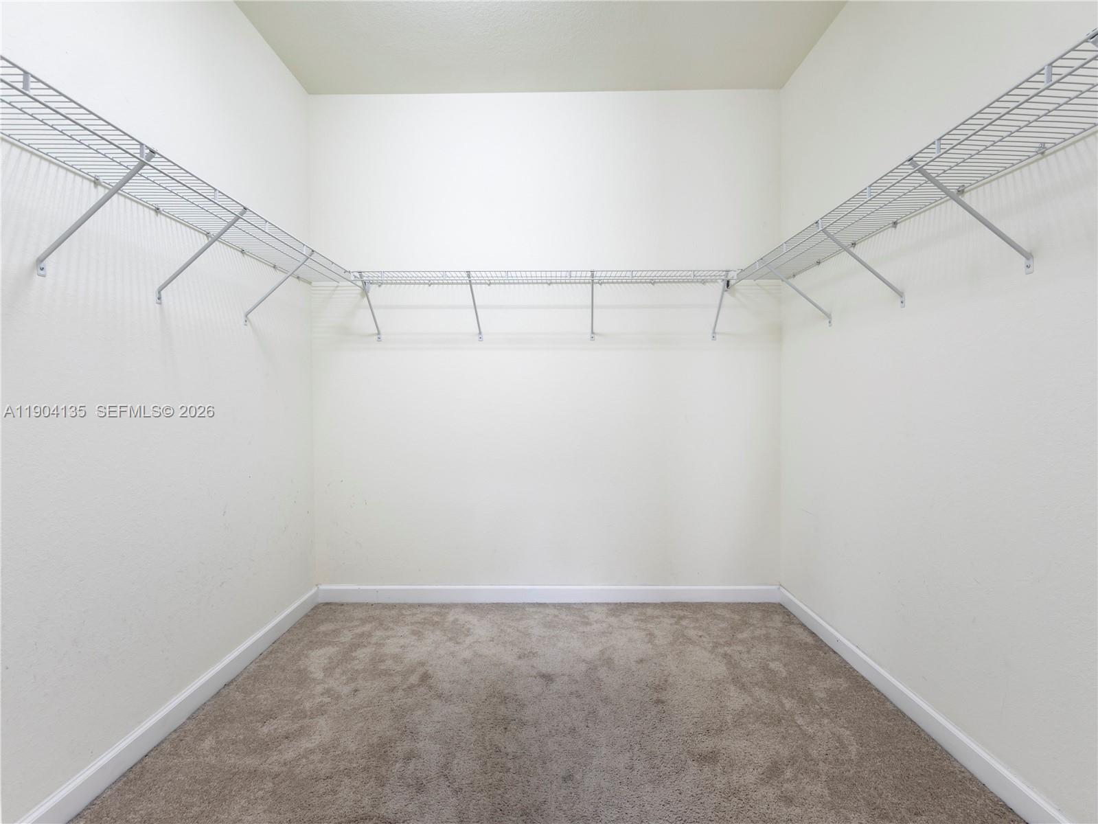 11410 Southwest 252nd Terrace Homestead, FL 33032 - Photo 23 of 38 a view of a room with racks on the wall