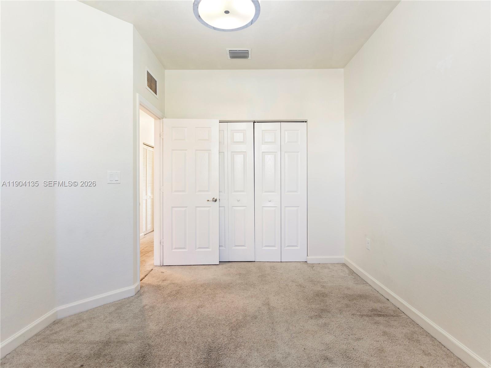 11410 Southwest 252nd Terrace Homestead, FL 33032 - Photo 26 of 38 a view of an empty room