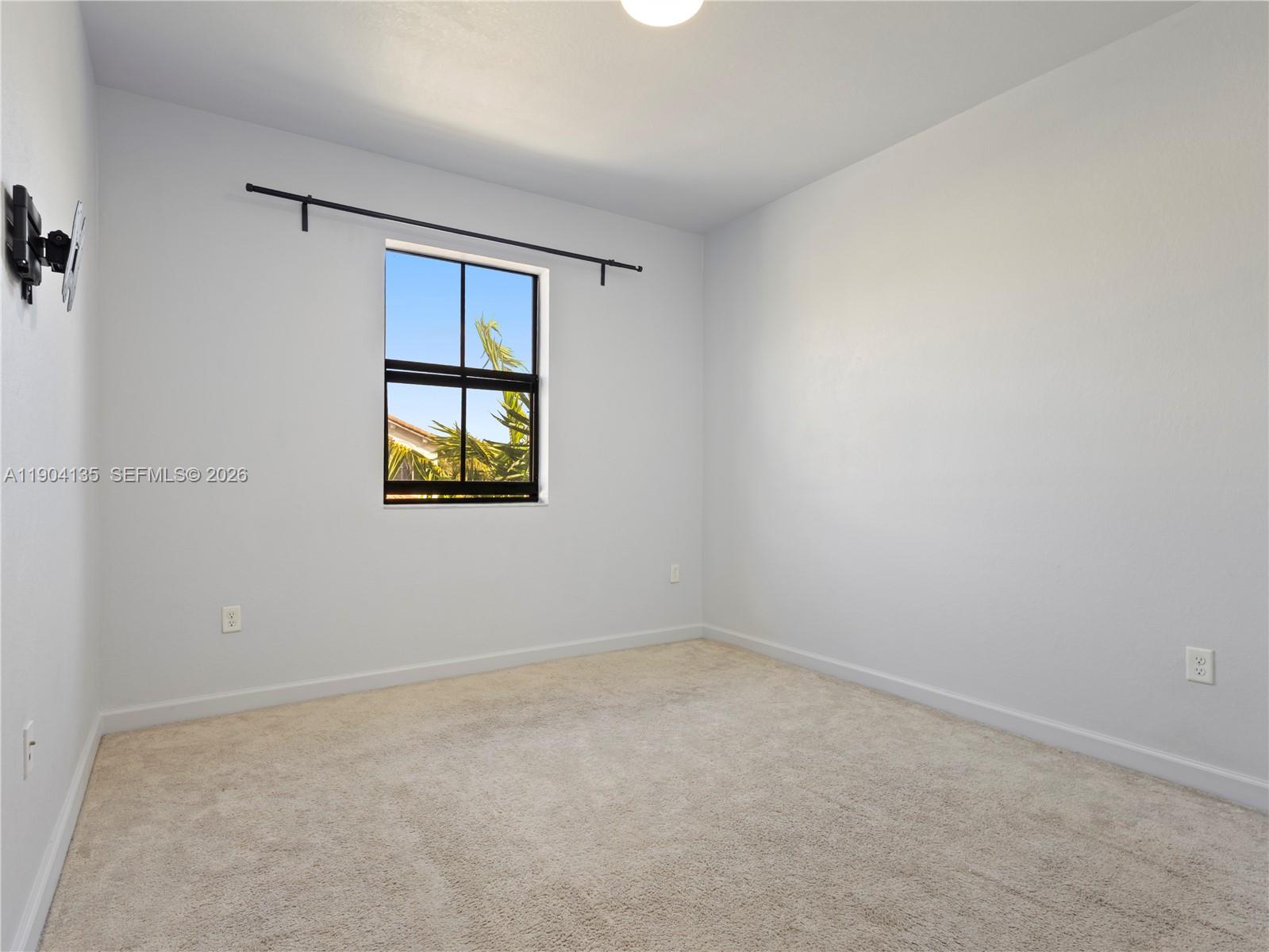 11410 Southwest 252nd Terrace Homestead, FL 33032 - Photo 28 of 38 a view of an empty room with a window