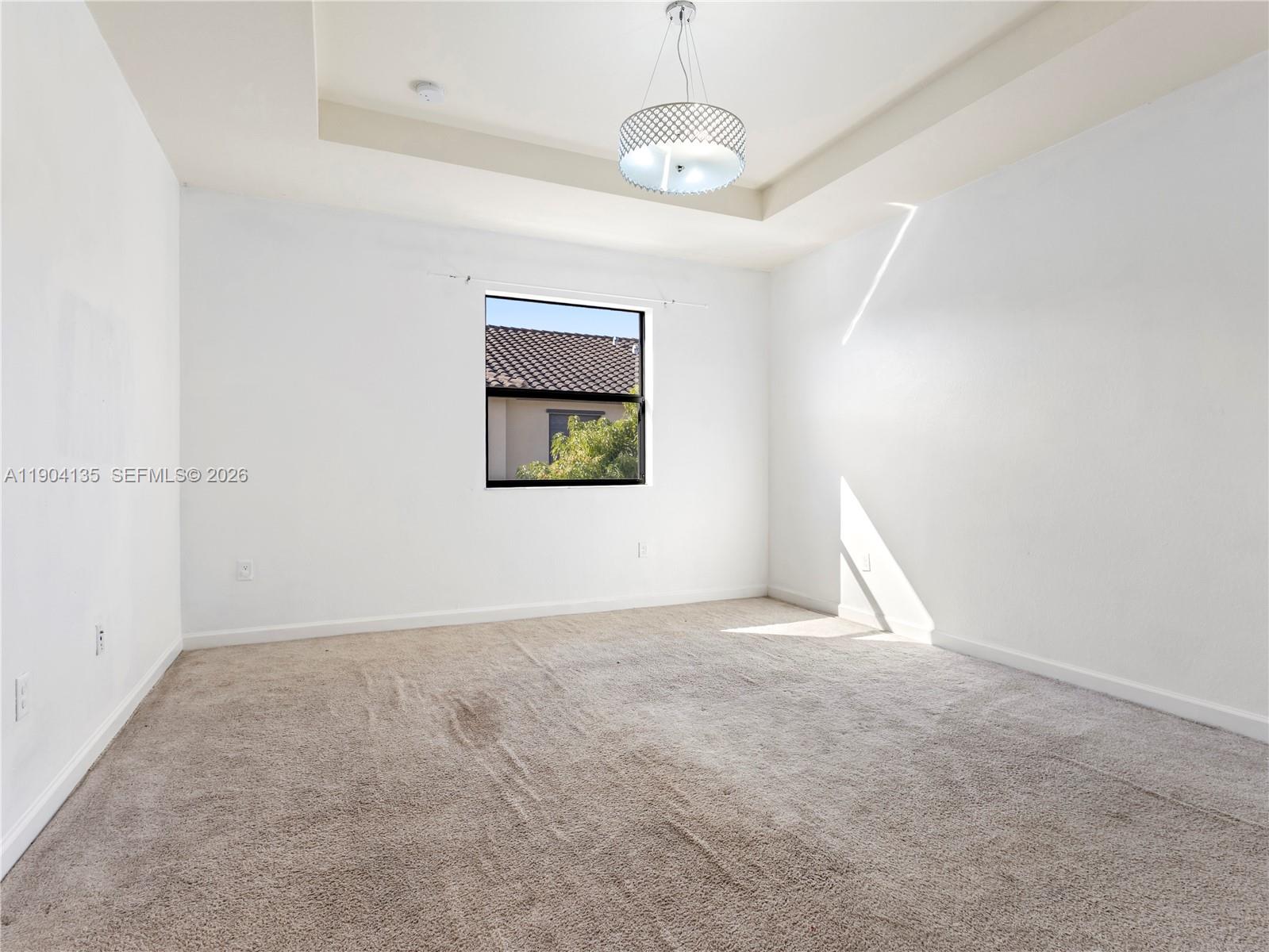 11410 Southwest 252nd Terrace Homestead, FL 33032 - Photo 31 of 38 a view of an empty room with a window