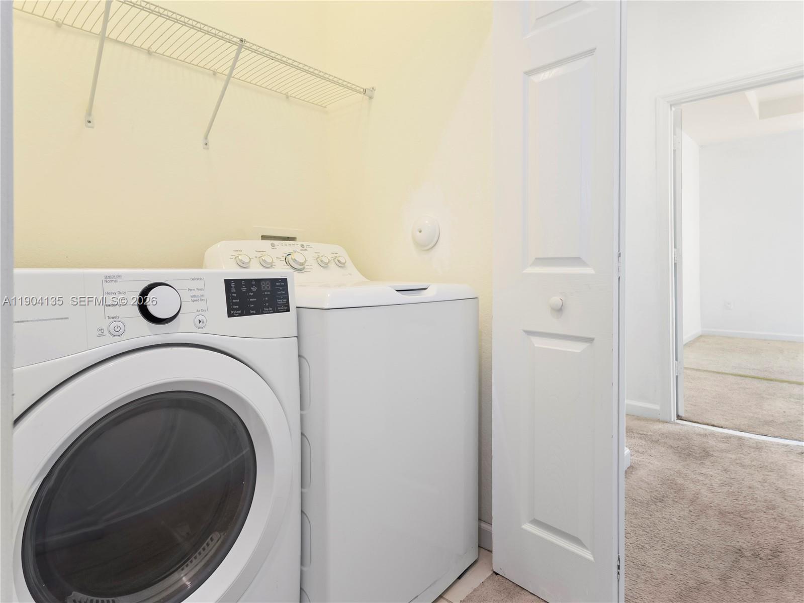 11410 Southwest 252nd Terrace Homestead, FL 33032 - Photo 36 of 38 a utility room with dryer and washer