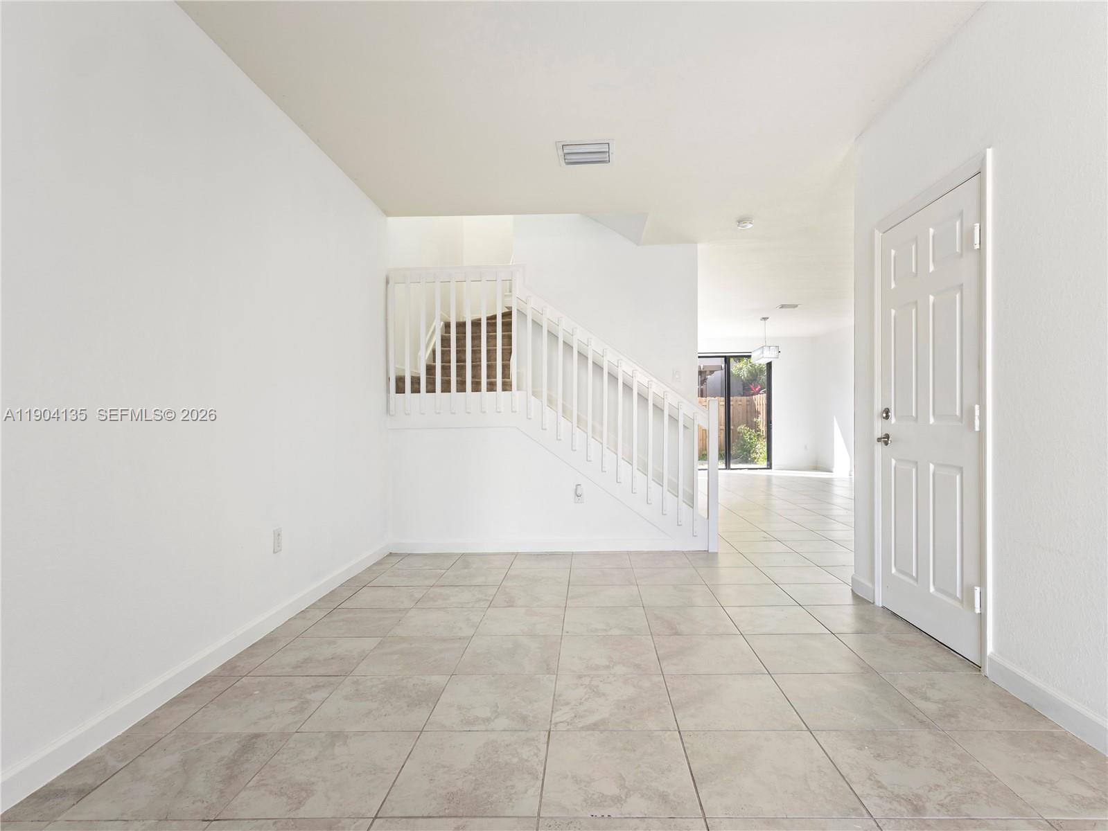 11410 Southwest 252nd Terrace Homestead, FL 33032 - Photo 10 of 38 a view of a hallway with a hallway