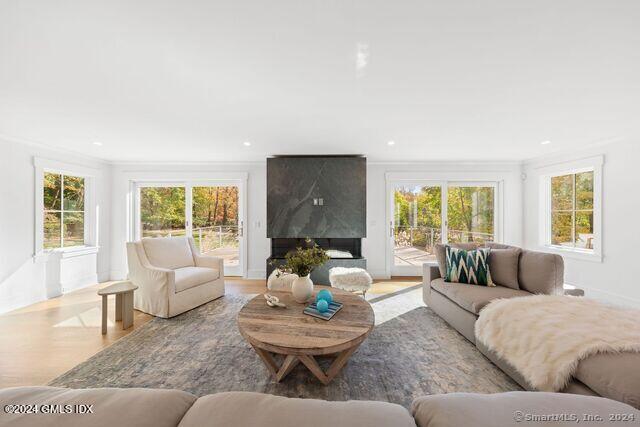 77 Stanton Road Darien, CT 06820 - Photo 17 of 39 a living room with furniture and a large window