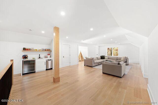 77 Stanton Road Darien, CT 06820 - Photo 34 of 39 a living room with furniture and kitchen view