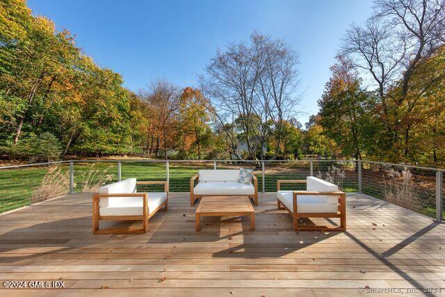 77 Stanton Road Darien, CT 06820 - Photo 38 of 39 a view of a patio with swimming pool and sitting area