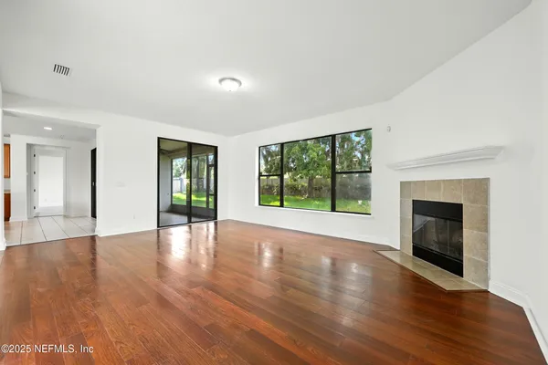 a kitchen with granite countertop a sink and a stove
