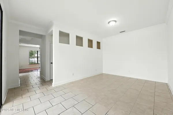 a bathroom with a granite countertop sink a mirror and a shower