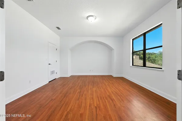 a view of a garden with a bench