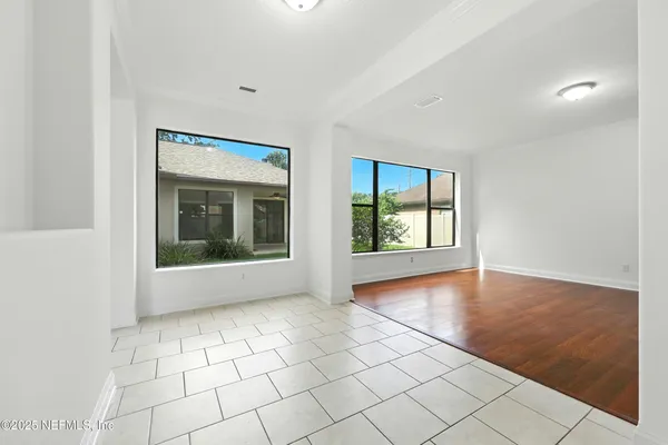 a view of a room with a hallway